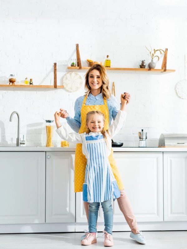 remodel-contractors-near-me-mother-daughter-smiling-kitchen